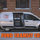 A photo of a worker taking tools out the back of a Transit Connect van.